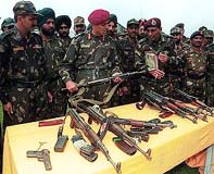 Lt-Gen V. G. Patankar, GOC of the Srinagar-based 15 Corps, inspects arms and ammunition