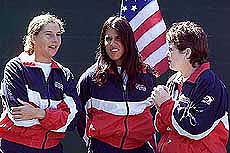 USA team captain Billie Jean King talks with singles players 