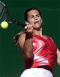 Amelie Mauresmo of France returns a forehand