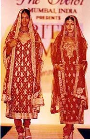 Models wear bridal collections of fashion designer Ritu Kumar