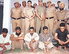 Harjit Singh (centre) was nabbed along with members of his gang by Panchkula police on Sunday.