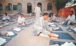 Pakistan election staff prepare referendum material