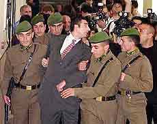 Ali Umit Demir struggles between gendarmes