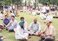 Aspirants for the Congress ticket for the municipal elections wait outside Circuit House