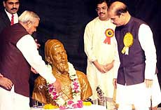 Prime Minister Atal Behari Vajpayee pays floral tribute to the statue of Chattrapati Shivaji