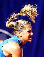 Russian Anna Kournikova follows through on her serve