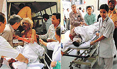 Persons who suffered burn injuries in the crash arrive in the hospital