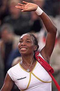 Venus Williams of the USA waves to the audience