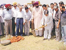 Mr Pawan Bansal, MP from Chandigarh, launches the development work of the Sarv Mangal Cooperative House Building Society (Phase II) project in Zirakpur on Sunday.