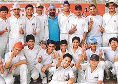 Team members of the Ludhiana XI  with their coach Charanjit Saini