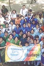MOTHER EARTH: The students taking part in a competition for the cause of environment.
