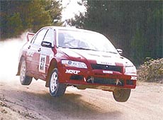 Naren Kumar of Team MRF drives through the difficult forest route