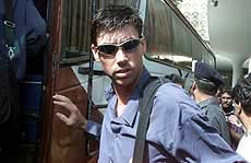 New Zealand cricket captain Stephen Fleming prepares to board a bus