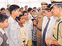 The UT Administrator, Lieut-Gen J.F.R. Jacob (retd), interacts with children