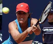 US player Jeniffer Capriati returns the ball