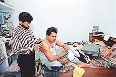 Ashok Kumar, who was severely beaten up by robbers who struck at his house in Naya Gaon village on Friday morning.