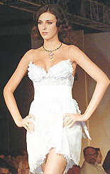 A model displays an outfit during the first day of the New Delhi International Fashion Week.