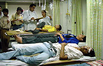 Body-builders from all over Punjab admitted at DMC Hospital after being taken ill due to food poisioning allegedly after consuming contaminated soya milk at a body-building competition in Ludhiana on Sunday.