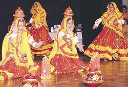 Students of Dev Samaj College of Education, Sector 36, present a cultural item at the annual prize distribution function at Tagore Theatre in Chandigarh on Monday.