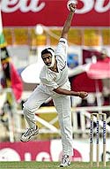 Anil Kumble bowls against the West Indies