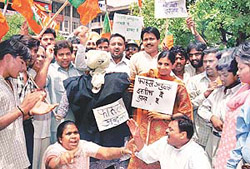 Activists of the local unit of the Bharatiya Janata Yuva Morcha protest against the massacre of relatives of Armymen on Wednesday in Chandigarh.