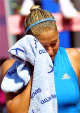 Russia�s Anna Kournikova reacts after losing her match