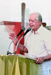 Former U.S. President Jimmy Carter talks during a meeting with Cuban church leaders