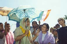 Despite scorching heat, candidates of Municipal Corporation go from door to door for canvassing on Friday. 