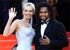 French soccer player Christian Karembeu and his wife