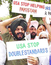 Mr M.S. Bitta, President of the All-India Anti-Terrorist Front, and other activists demonstrate near the US embassy