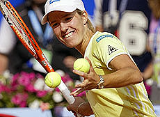 Belgium's Justine Henin hits balls