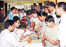 Visitors line up at an organ-donation public-awareness camp in the new OPD block, PGI, Chandigarh, on Monday.