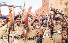 ITBP jawans in jubilant mood after the passing-out parade at the basic training centre at Bhanu in Panchkula on Monday.