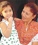 Little Simranjit and her mother, Omi, are all smiles at being reunited after two years, in Chandigarh on Tuesday.
