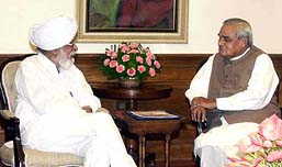 Prime Minister Atal Behari Vajpayee with CPM leader Harkishen Singh Surjeet