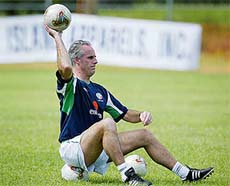 Ireland's manager Mick McCarthy throws a ball 