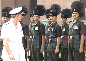 Admiral Sir Michael Boyce, Chief of Defence Staff of Britain, inspects a guard of honour