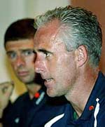 Ireland's manager Mick McCarthy with Niall Quinn talks to journalists at a press conference in Saipan on Thursday prior to the team's departure to Izumo. 