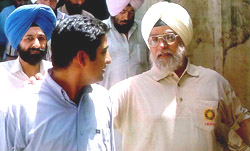 Former cricketer Bishan Singh Bedi comes out of a court
