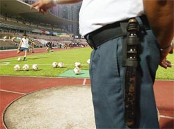 Portugal's Luis Figo practices corner kicks