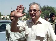 Pakistani High Commissioner to India Ashraf Jehangir Qazi waves to reporters