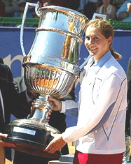 Monica Seles of the United States holds her cup
