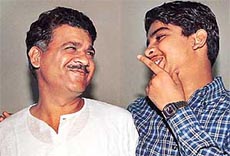 DSP Jagdish Nagar shares a light moment with his son, Saksham, upon reaching home after six days in captivity at Kandela village in Jind district. 