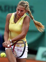 Anna Kournikova of Russia returns a backhand to Daja Bedanova of the Czech Republic