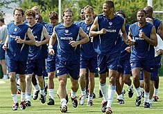 US players train during the team's workout 