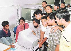 Students at a cyber cafe in Sector 32 of Chandigarh late on Monday evening to check the CBSE Class X results on the Internet.