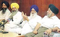 L to R: Prem SIngh Chandumajra, Bhai Ranjit Singh, Gurcharan Singh Tohra and Paramjeet Singh Sarna during a press conference in the capital on Monday.