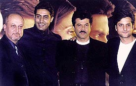 Indian film stars actor-director Anupam Kher, Abhishek Bachhan, Anil Kapoor and Fardeen Khan pose for photographers