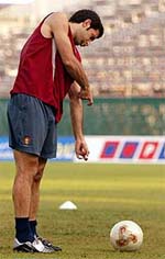 Portugal's Luis Figo pretends to shoot a ball