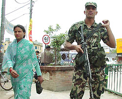 A Nepalese soldier stands guard